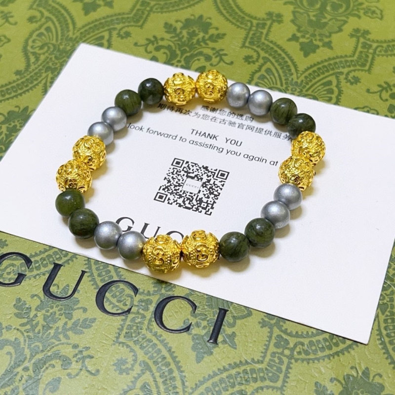 G*u*i bracelets